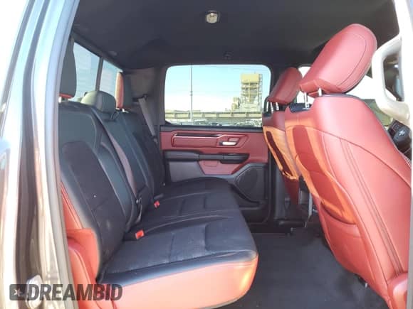 2020 Ram 1500 Rebel z VIN 1C6RRELT9LN303468, wystawiony jako Copart lot #71399722 z przebiegiem 18 822 mil mil oraz . Historia ofert i sprzedaży dostępna na DreamBid. Obrazek 6.