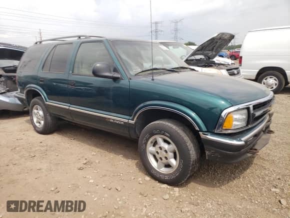 1997 Chevrolet Blazer LS с VIN 1GNDT13W9V2260978, выставлен на аукционе Copart как лот 55020274 с пробегом 125 005 миль миль и Списание • Salvage title. История ставок и продаж доступна на DreamBid. Изображение 4.