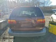 ✅ 1999 Toyota Sienna LE • VIN: 4T3ZF13CXXU118712 • Лот: 96823615. Опубликован ранее на Copart с пробегом 334 701 миль. Бесплатный доступ к архиву аукционных продаж из США и подробный отчёт об истории автомобиля на DreamBid. Изображение 6.