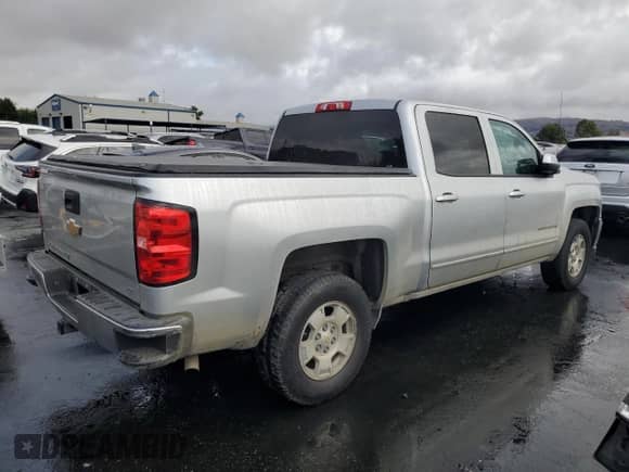 2017 Chevrolet Silverado 1500 LT z VIN 3GCUCRERXHG480172, wystawiony jako Copart lot #81976525 z przebiegiem 102 958 mil mil oraz Szkoda całkowita • Salvage title. Historia ofert i sprzedaży dostępna na DreamBid. Obrazek 3.