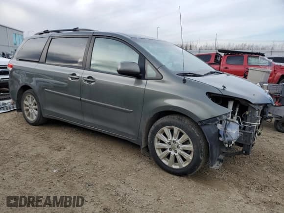✅ 2012 Toyota Sienna LE • VIN: 5TDJK3DC7CS039741 • Lot: 91675575. Listed on Copart with 215,437 mi. Free auction sales archive from the USA and detailed vehicle history report at DreamBid. Image 4.