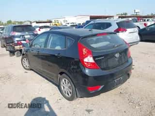 2013 Hyundai Accent GS with VIN KMHCT5AE6DU084637, listed as a IAAI auction lot 43226223 with 200,530 mi miles and . Bid and sale history available at DreamBid. Image 3.