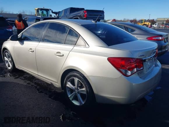 2014 Chevrolet Cruze 2LT with VIN 1G1PE5SBXE7257699, listed as a IAAI auction lot 43514227 with 131,115 mi miles and . Bid and sale history available at DreamBid. Image 3.
