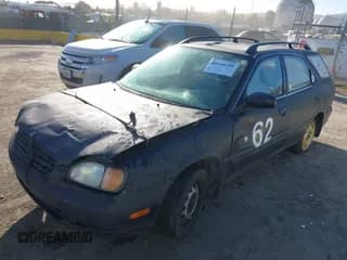 ✅ 2001 Suzuki Esteem GL • VIN: JS2GB41W515201910 • Lot: 41646209. Wystawiony na IAAI z przebiegiem 326 239 mil. Bezpłatny archiwum sprzedaży aukcyjnych z USA i szczegółowy raport historii pojazdu na DreamBid. Zdjęcie 2.