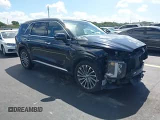 2023 Hyundai Palisade Calligraphy z VIN KM8R74GE5PU500844, wystawiony jako IAAI lot #43354906 z przebiegiem 63 427 mil mil oraz . Historia ofert i sprzedaży dostępna na DreamBid. Obrazek 1.