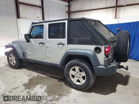 ✅ 2008 Jeep Wrangler Unlimited Rubicon • VIN: 1J4GA69128L590958 • Lot: 54013755. Listed on Copart with 146,997 mi. Free auction sales archive from the USA and detailed vehicle history report at DreamBid. Image 2.