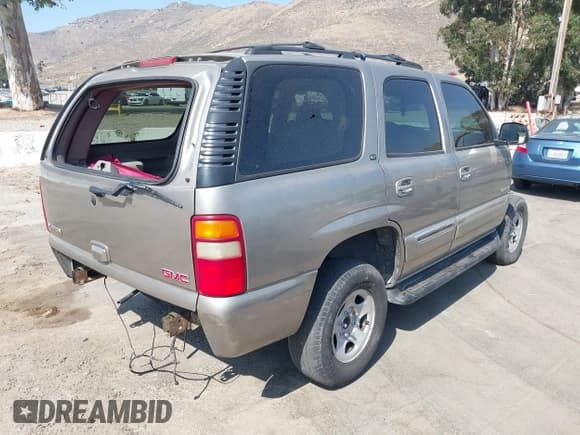 ✅ 2003 GMC Yukon SLT • VIN: 1GKEC13T43R265596 • Lot: 42382502. Wystawiony na IAAI z przebiegiem Nie podano. Bezpłatny archiwum sprzedaży aukcyjnych z USA i szczegółowy raport historii pojazdu na DreamBid. Zdjęcie 4.