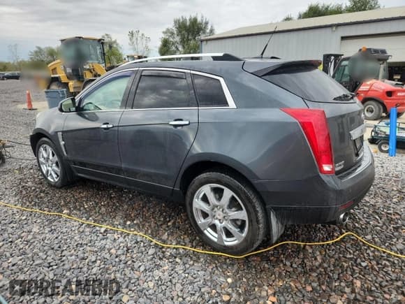✅ 2012 Cadillac SRX Performance Collection • VIN: 3GYFNBE30CS598950 • Lot: 81205505. Listed on Copart with 96,413 mi. Free auction sales archive from the USA and detailed vehicle history report at DreamBid. Image 2.