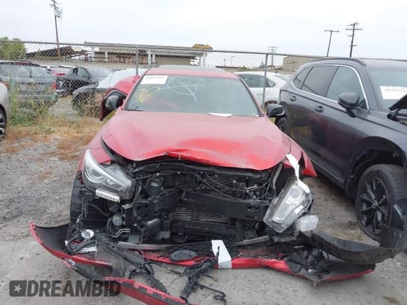 ✅ 2021 Infiniti Q50 Red Sport 400 • VIN: JN1FV7DP7MM850432 • Lot: 42057935. Listed on IAAI with 15,936 mi. Free auction sales archive from the USA and detailed vehicle history report at DreamBid. Image 13.