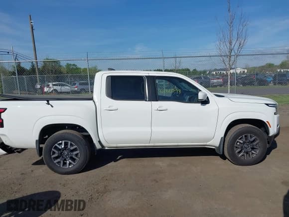 ✅ 2024 Nissan Frontier SV • VIN: 1N6ED1EKXRN665480 • Lot: 42060798. Listed on IAAI with 4,245 mi. Free auction sales archive from the USA and detailed vehicle history report at DreamBid. Image 13.