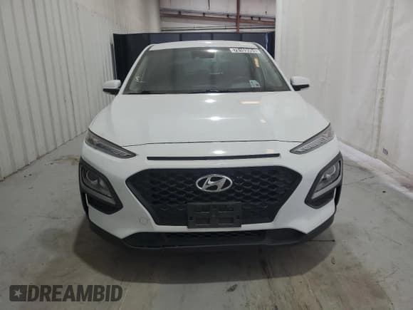 ✅ 2019 Hyundai Kona SE • VIN: KM8K12AA2KU332988 • Лот: 76169994. Опубликован ранее на Copart с пробегом 79 545 миль. Бесплатный доступ к архиву аукционных продаж из США и подробный отчёт об истории автомобиля на DreamBid. Изображение 5.