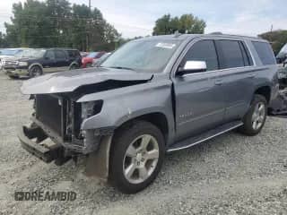 2020 Chevrolet Tahoe Premier z VIN 1GNSKCKC2LR298926, wystawiony jako Copart lot #72059995 z przebiegiem 65 025 mil mil oraz Szkoda całkowita • Salvage title. Historia ofert i sprzedaży dostępna na DreamBid. Obrazek 1.