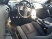 ✅ 2004 Nissan 350Z Enthusiast • VIN: JN1AZ34D24T150448 • Lot: 71831135. Wystawiony na Copart z przebiegiem 148 647 mil. Bezpłatny archiwum sprzedaży aukcyjnych z USA i szczegółowy raport historii pojazdu na DreamBid. Zdjęcie 8.