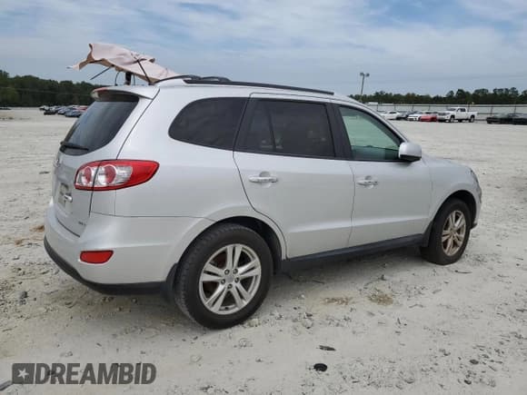 ✅ 2012 Hyundai Santa Fe Limited • VIN: 5XYZK4AG9CG161532 • Lot: 70388424. Listed on Copart with 75,794 mi. Free auction sales archive from the USA and detailed vehicle history report at DreamBid. Image 3.