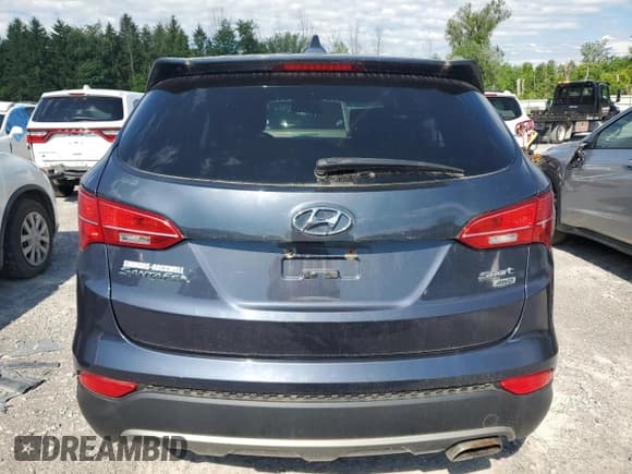 ✅ 2015 Hyundai Santa Fe • VIN: 5XYZTDLBXFG251775 • Лот: 59869124. Опубликован ранее на Copart с пробегом Не указан. Бесплатный доступ к архиву аукционных продаж из США и подробный отчёт об истории автомобиля на DreamBid. Изображение 6.