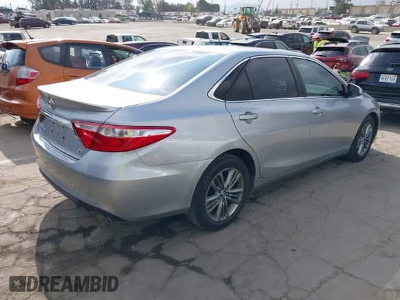 2016 Toyota Camry SE with VIN 4T1BF1FKXGU185596, listed as a IAAI auction lot 43200360 with 84,797 mi miles and . Bid and sale history available at DreamBid. Image 4.