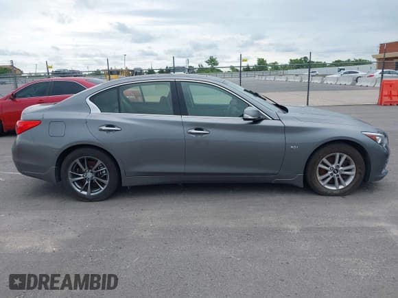 ✅ 2017 Infiniti Q50 Signature Edition • VIN: JN1EV7AR6HM841146 • Lot: 42372309. Wystawiony na IAAI z przebiegiem 95 984 mil. Bezpłatny archiwum sprzedaży aukcyjnych z USA i szczegółowy raport historii pojazdu na DreamBid. Zdjęcie 13.