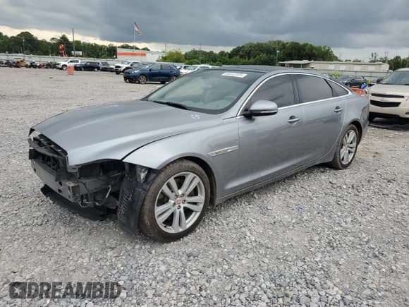 ✅ 2014 Jaguar XJ Portfolio • VIN: SAJWA2GZ3E8V61469 • Lot: 60643325. Listed on Copart with 127,151 mi. Free auction sales archive from the USA and detailed vehicle history report at DreamBid. Image 1.