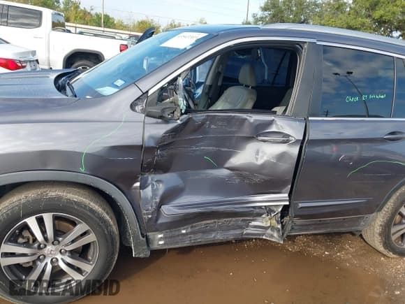 ✅ 2018 Honda Pilot EX-L • VIN: 5FNYF5H59JB027960 • Lot: 43543303. Listed on IAAI with 157,573 mi. Free auction sales archive from the USA and detailed vehicle history report at DreamBid. Image 6.