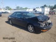 ✅ 1999 Acura CL • VIN: 19UYA3259XL000289 • Lot: 58470935. Listed on Copart with 141,026 mi. Free auction sales archive from the USA and detailed vehicle history report at DreamBid. Image 4.