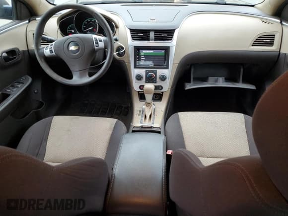 ✅ 2012 Chevrolet Malibu 1LS • VIN: 1G1ZB5E09CF150285 • Lot: 86843625. Listed on Copart with 129,115 mi. Free auction sales archive from the USA and detailed vehicle history report at DreamBid. Image 8.