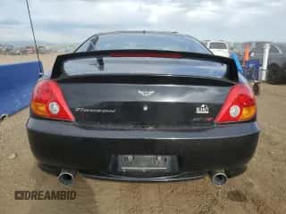 2004 Hyundai Tiburon GT с VIN KMHHN65F54U112663, выставлен на аукционе Copart как лот 60543975 с пробегом 51 589 миль миль и Списание • Salvage title. История ставок и продаж доступна на DreamBid. Изображение 6.