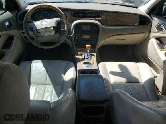 ✅ 2003 Jaguar S-Type • VIN: SAJEA01T63FM54011 • Lot: 71638065. Listed on Copart with 103,027 mi. Free auction sales archive from the USA and detailed vehicle history report at DreamBid. Image 8.