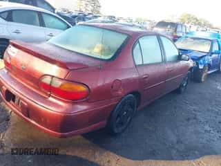 2003 Chevrolet Malibu LS z VIN 1G1NE52J13M554602, wystawiony jako IAAI lot #41415451 z przebiegiem 197 636 mil mil oraz . Historia ofert i sprzedaży dostępna na DreamBid. Obrazek 4.