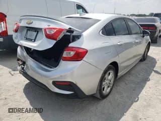 ✅ 2017 Chevrolet Cruze LT • VIN: 1G1BE5SM2H7194596 • Lot: 57413793. Listed on Copart with 111,213 mi. Free auction sales archive from the USA and detailed vehicle history report at DreamBid. Image 3.