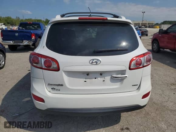 2012 Hyundai Santa Fe Limited с VIN 5XYZK3AB7CG156666, выставлен на аукционе Copart как лот 66958164 с пробегом 135 252 миль миль и На запчасти • Non repairable. История ставок и продаж доступна на DreamBid. Изображение 6.