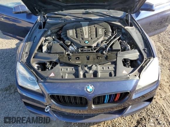 ✅ 2013 BMW 6 Series 650i • VIN: WBAYP9C56DD168702 • Лот: 52571895. Опубликован ранее на Copart с пробегом 85 521 миль. Бесплатный доступ к архиву аукционных продаж из США и подробный отчёт об истории автомобиля на DreamBid. Изображение 11.