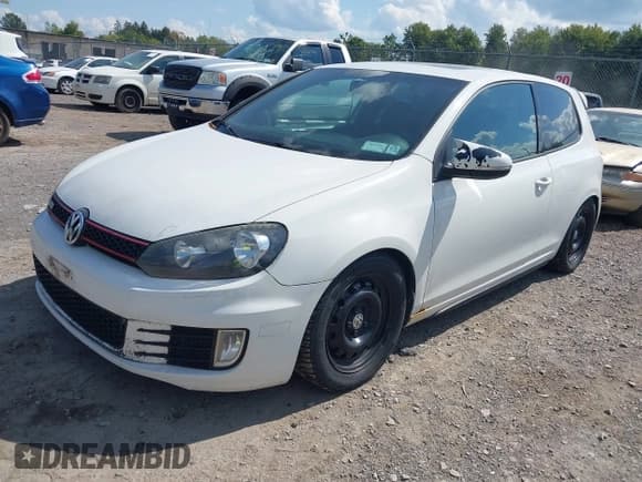 ✅ 2012 Volkswagen Golf GTI w/Conv & Sunroof • VIN: WVWEV7AJ7CW246942 • Lot: 43222962. Listed on IAAI with 116,306 mi. Free auction sales archive from the USA and detailed vehicle history report at DreamBid. Image 2.