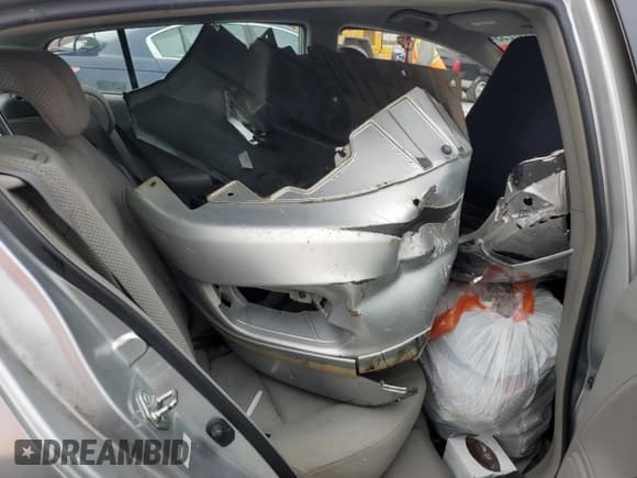 ✅ 2010 Honda Insight EX • VIN: JHMZE2H74AS001579 • Lot: 90097255. Listed on Copart with Not provided. Free auction sales archive from the USA and detailed vehicle history report at DreamBid. Image 10.