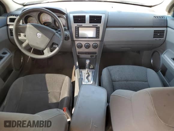 2008 Dodge Avenger SXT with VIN 1B3LC56K28N282040, listed as a Copart auction lot 63027394 with 187,033 mi miles and Salvage title. Bid and sale history available at DreamBid. Image 8.