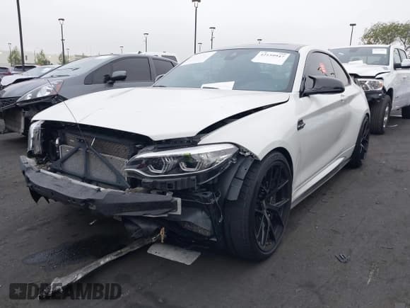 ✅ 2021 BMW M2 Competition • VIN: WBS2U7C02M7H08082 • Lot: 42159947. Listed on IAAI with 22,830 mi. Free auction sales archive from the USA and detailed vehicle history report at DreamBid. Image 2.