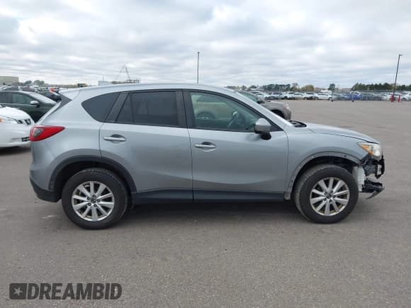✅ 2014 Mazda CX-5 Touring • VIN: JM3KE4CY4E0380252 • Lot: 43510717. Wystawiony na IAAI z przebiegiem 207 051 mil. Bezpłatny archiwum sprzedaży aukcyjnych z USA i szczegółowy raport historii pojazdu na DreamBid. Zdjęcie 13.