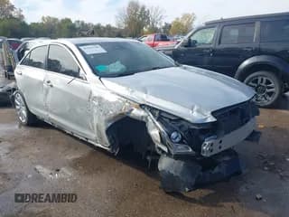 ✅ 2014 Cadillac ATS Luxury AWD • VIN: 1G6AH5SX1E0105774 • Lot: 43593748. Listed on IAAI with 59,326 mi. Free auction sales archive from the USA and detailed vehicle history report at DreamBid. Image 1.