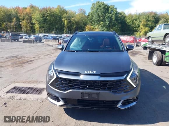 ✅ 2025 Kia Sportage SX-Prestige • VIN: KNDPXCDG4S7209495 • Лот: 43364823. Опубликован ранее на IAAI с пробегом 5 838 миль. Бесплатный доступ к архиву аукционных продаж из США и подробный отчёт об истории автомобиля на DreamBid. Изображение 12.