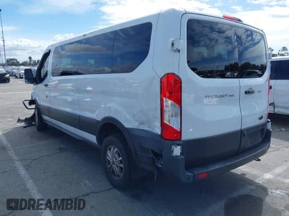 ✅ 2021 Ford Transit Passenger XL • VIN: 1FBAX2Y88MKA15155 • Lot: 41730982. Listed on IAAI with 70,357 mi. Free auction sales archive from the USA and detailed vehicle history report at DreamBid. Image 3.