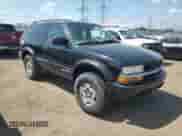 2005 Chevrolet Blazer LS with VIN 1GNCT18X45K101945, listed as a Copart auction lot 62762255 with 160,212 mi miles and Salvage title. Bid and sale history available at DreamBid. Image 4.