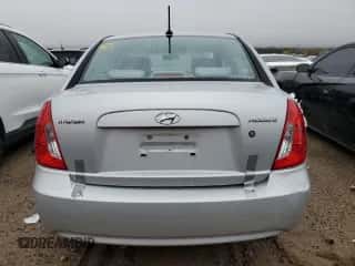 2011 Hyundai Accent GLS z VIN KMHCN4AC2BU536969, wystawiony jako Copart lot #76917784 z przebiegiem 77 868 mil mil oraz Szkoda całkowita • Salvage title. Historia ofert i sprzedaży dostępna na DreamBid. Obrazek 6.
