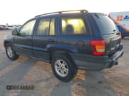 ✅ 2004 Jeep Grand Cherokee Laredo • VIN: 1J4GW48S14C210700 • Lot: 43679269. Listed on IAAI with 215,238 mi. Free auction sales archive from the USA and detailed vehicle history report at DreamBid. Image 3.
