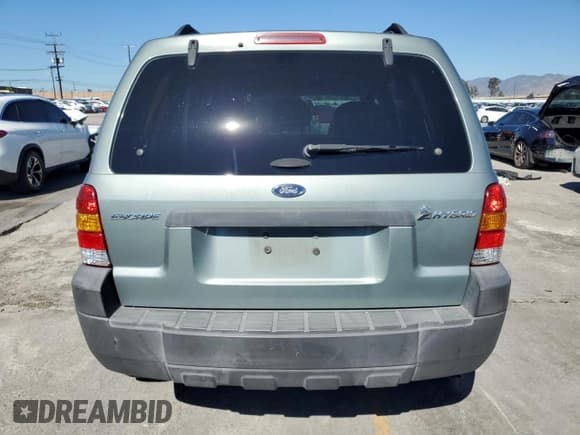 ✅ 2007 Ford Escape Hybrid • VIN: 1FMCU49H07KB70483 • Лот: 86858235. Опубликован ранее на Copart с пробегом 154 793 миль. Бесплатный доступ к архиву аукционных продаж из США и подробный отчёт об истории автомобиля на DreamBid. Изображение 6.