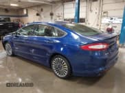 ✅ 2014 Ford Fusion Titanium Hybrid • VIN: 3FA6P0RU6ER175894 • Lot: 43220307. Listed on IAAI with 157,170 mi. Free auction sales archive from the USA and detailed vehicle history report at DreamBid. Image 3.