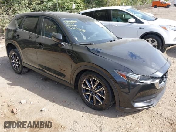 ✅ 2018 Mazda CX-5 Touring • VIN: JM3KFBCM0J0429309 • Lot: 43365581. Listed on IAAI with 138,988 mi. Free auction sales archive from the USA and detailed vehicle history report at DreamBid. Image 1.