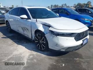 2024 Honda Accord Touring z VIN 1HGCY2F82RA070462, wystawiony jako IAAI lot #43124035 z przebiegiem 24 073 mil mil oraz . Historia ofert i sprzedaży dostępna na DreamBid. Obrazek 1.