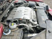 ✅ 2002 Cadillac Eldorado Touring ETC • VIN: 1G6ET12962B101911 • Lot: 42520564. Listed on IAAI with 154,584 mi. Free auction sales archive from the USA and detailed vehicle history report at DreamBid. Image 13.