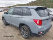 ✅ 2023 Honda Passport EX-L • VIN: 5FNYF8H52PB020259 • Lot: 43397461. Wystawiony na IAAI z przebiegiem 26 000 mil. Bezpłatny archiwum sprzedaży aukcyjnych z USA i szczegółowy raport historii pojazdu na DreamBid. Zdjęcie 3.