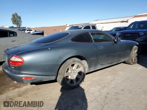 ✅ 2000 Jaguar XK • VIN: SAJJA41C4YNA05738 • Lot: 45776815. Listed on Copart with 53,788 mi. Free auction sales archive from the USA and detailed vehicle history report at DreamBid. Image 3.