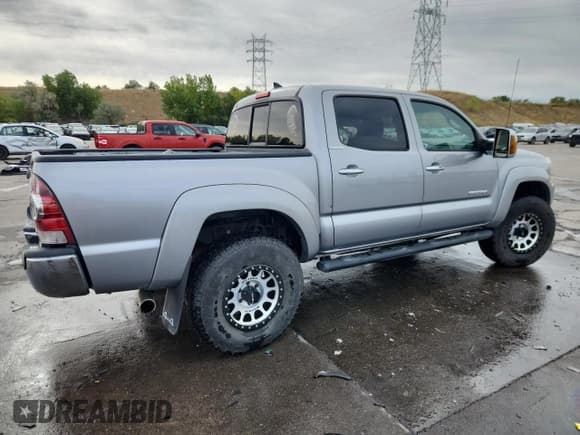 ✅ 2015 Toyota Tacoma • VIN: 3TMLU4EN9FM182106 • Lot: 82088595. Wystawiony na Copart z przebiegiem 97 442 mil. Bezpłatny archiwum sprzedaży aukcyjnych z USA i szczegółowy raport historii pojazdu na DreamBid. Zdjęcie 3.